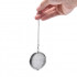 A tea infuser in the shape of a sphere with a diameter of 5 cm.