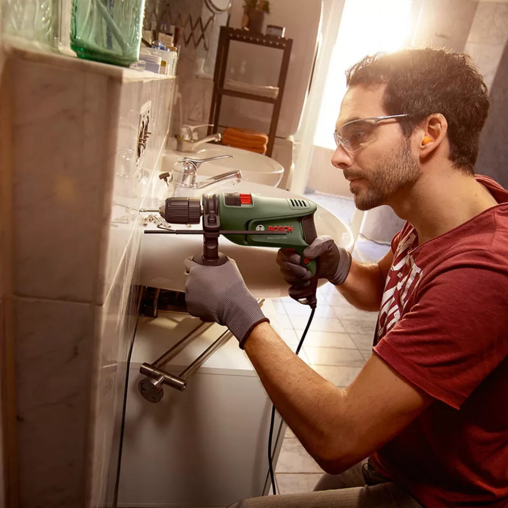 Электродрель ударная Bosch EasyImpact 600 с кейсом для хранения 0603133000