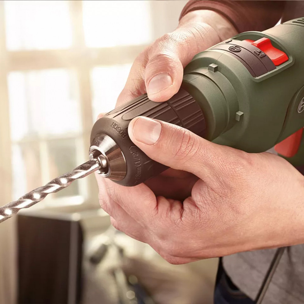 Электродрель ударная Bosch EasyImpact 600 с кейсом для хранения 0603133000