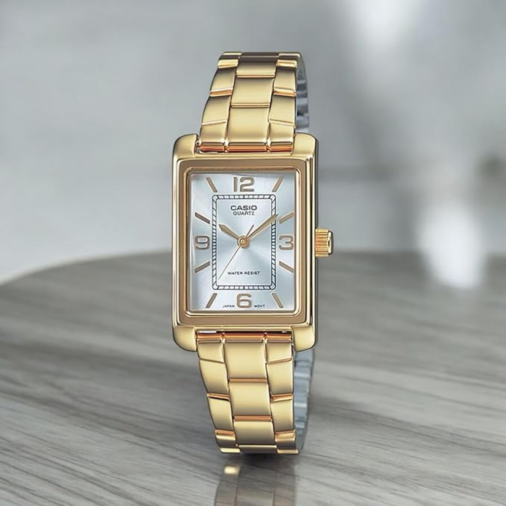 Женские наручные часы Casio LTP-1234PG-7AEG с золотым браслетом