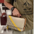 Michael Kors Cooper crossbody bag with embossing and stripes brown